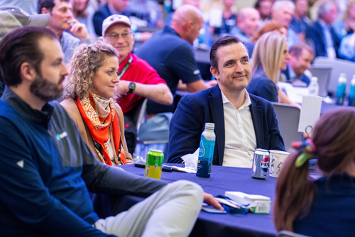 3 attendees watching the Waste360 awards