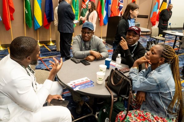 Group having a conversation at the international reception