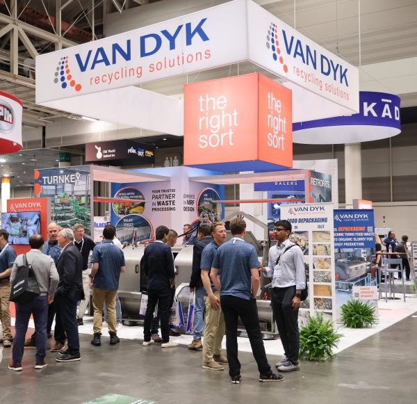 Van Dyk Booth with a line of attendees outside of it on the WasteExpo Show Floor